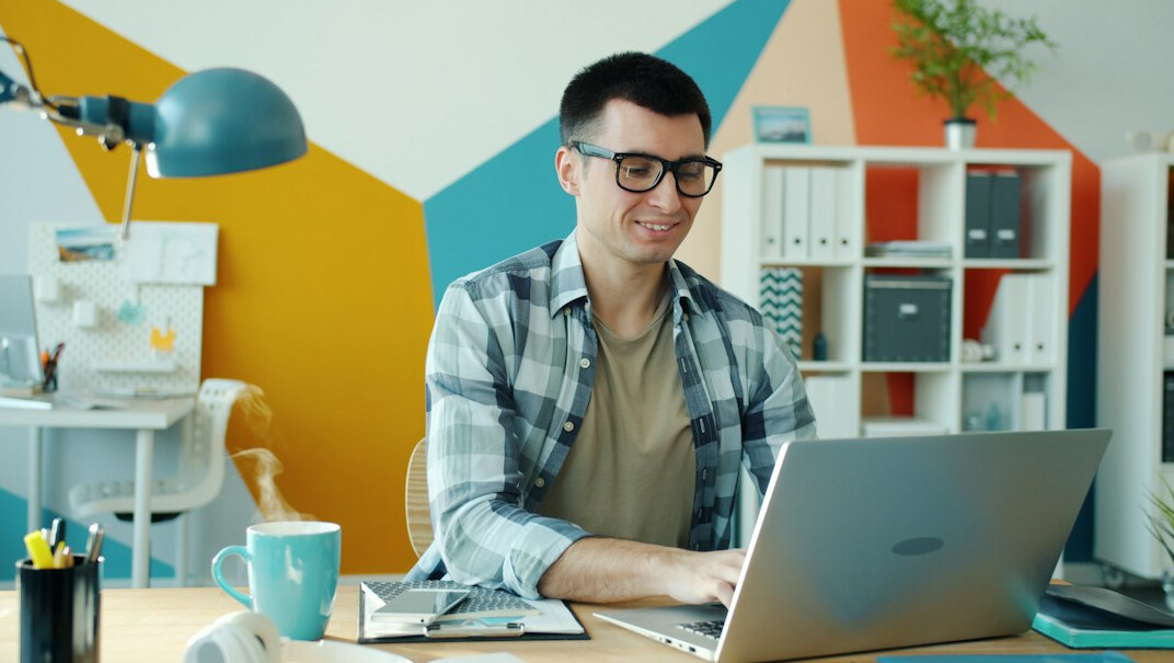 creative designer working on laptop