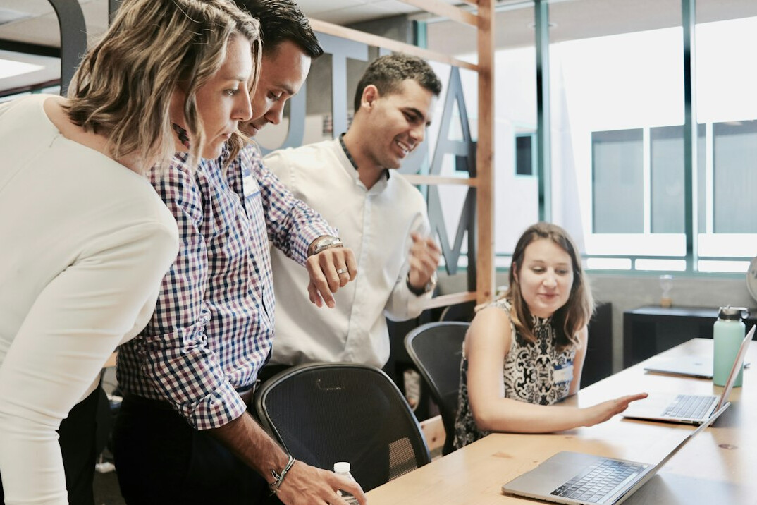diverse team collaborating on ai project